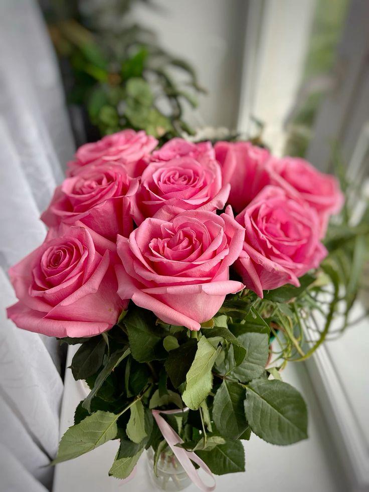 Professional floral arrangement in modern corporate setting